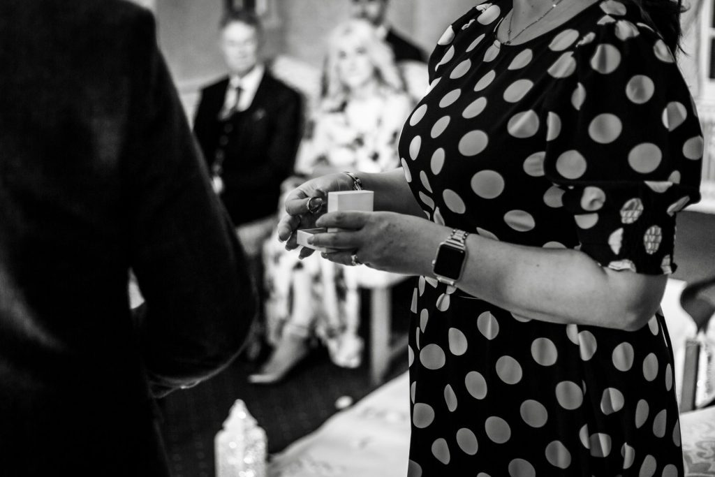 Wedding guests during their wedding ceremony at their micro wedding at The Cavendish Hotel