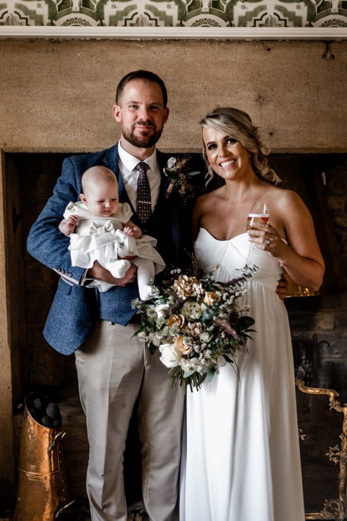 Bride & Groom pose inside their venue after the wedding ceremony at their micro wedding at The Cavendish Hotel