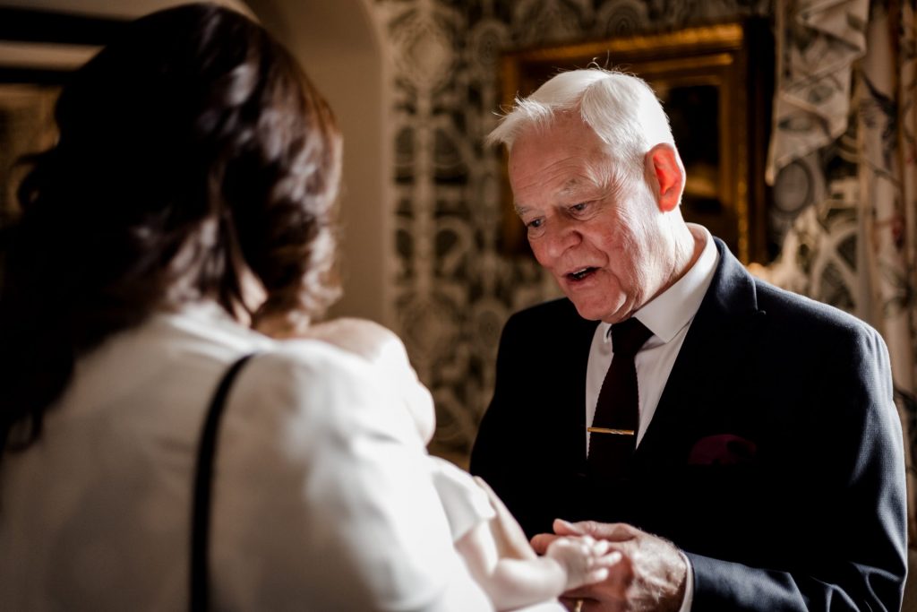 Candid photo of wedding guests at a micro wedding at The Cavendish Hotel