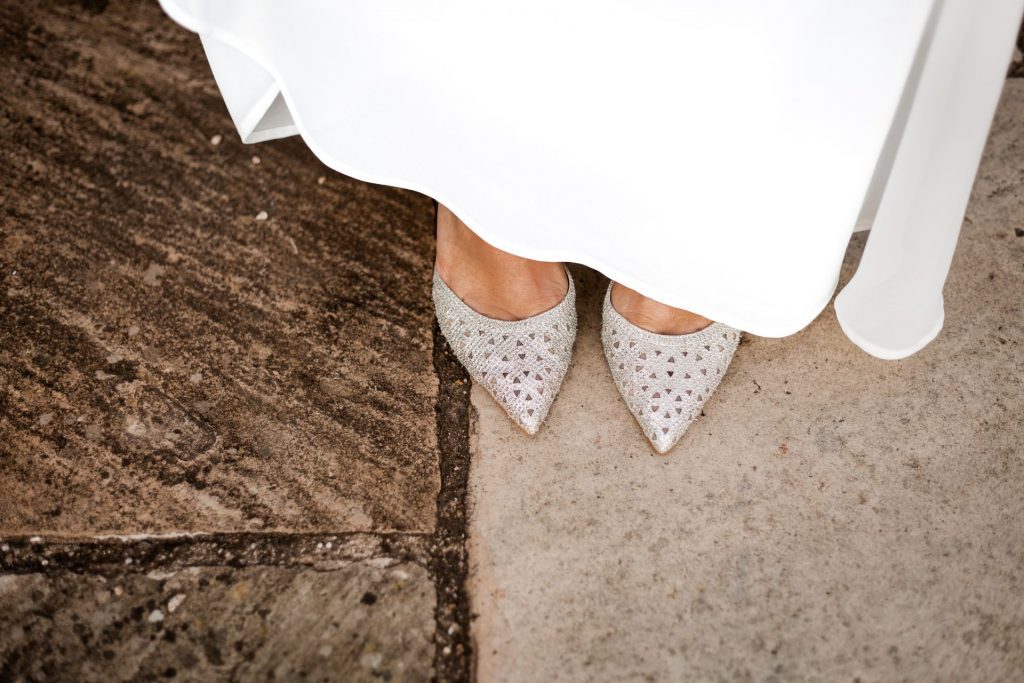 Detail photo of the Brides wedding shoes at the micro wedding at The Cavendish Hotel