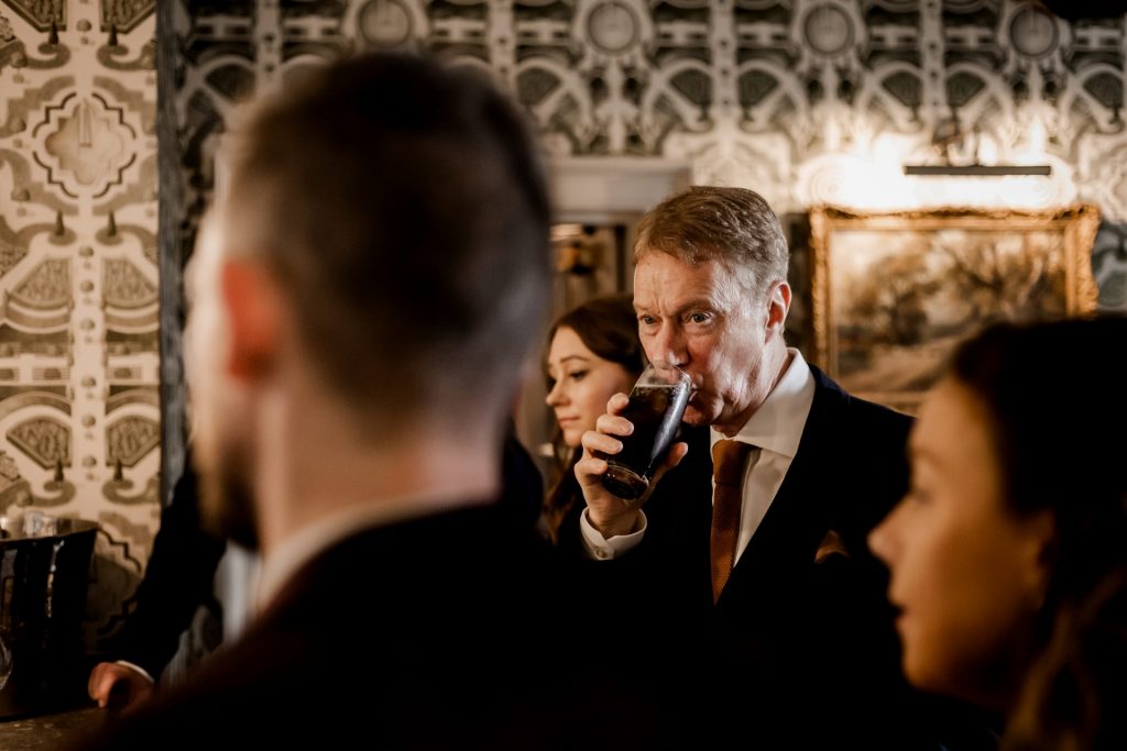 Candid photo of wedding guests at a micro wedding at The Cavendish Hotel