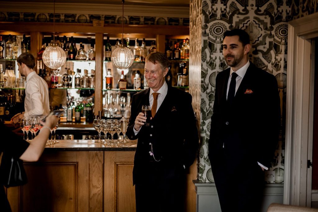 Candid photo of wedding guests at a micro wedding at The Cavendish Hotel