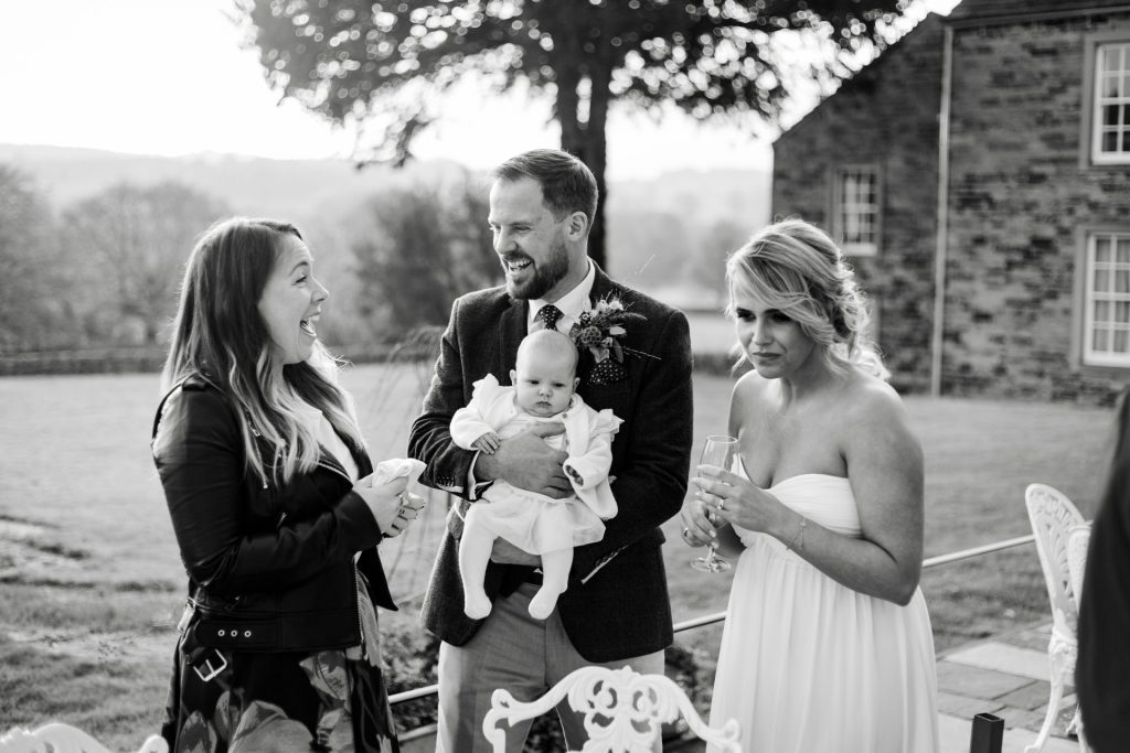 Candid photo of Bride & Groom and wedding guests at a micro wedding at The Cavendish Hotel
