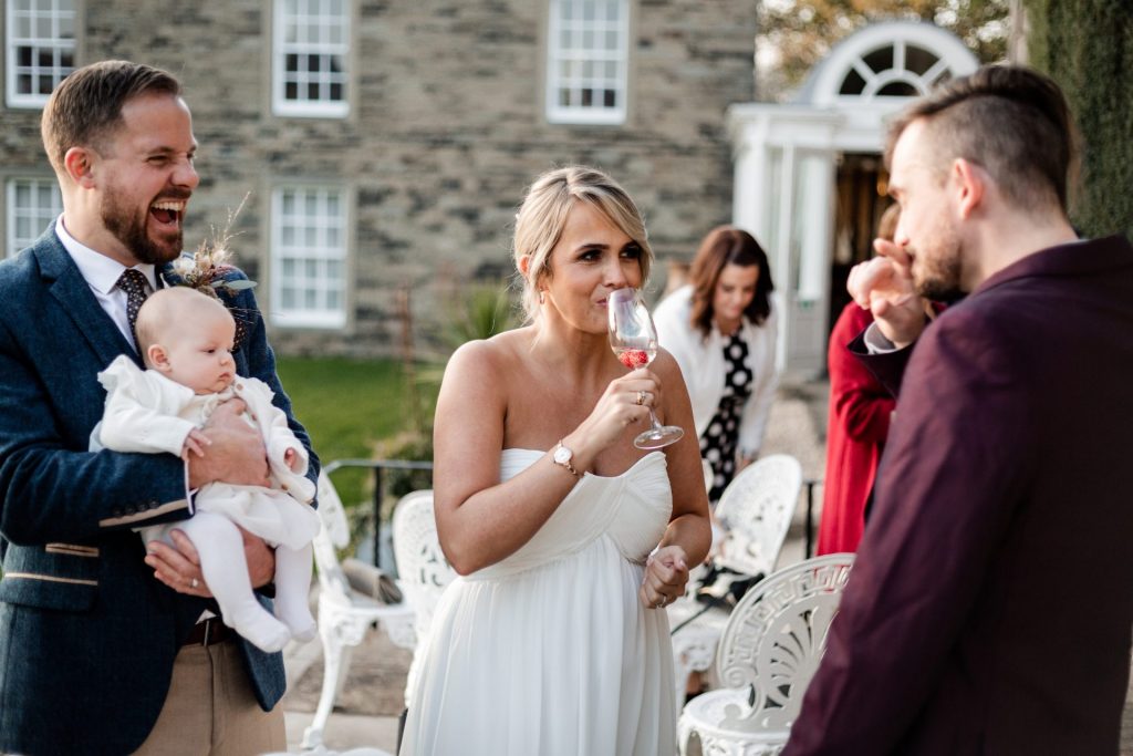 Candid photo of Bride and wedding guests at a micro wedding at The Cavendish Hotel
