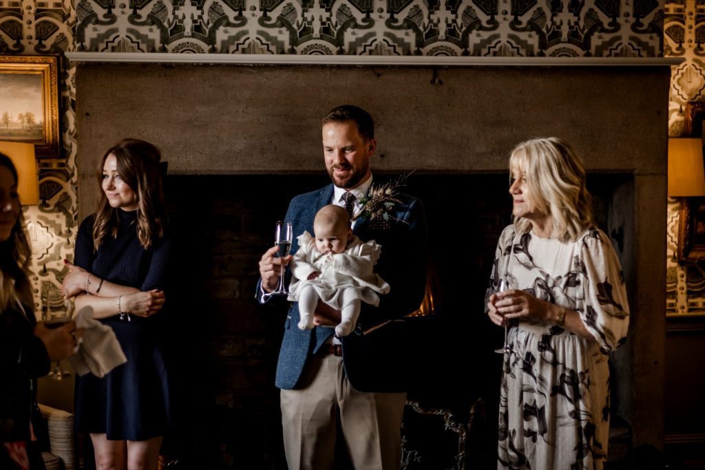 Candid photo of Groom and wedding guests at a micro wedding at The Cavendish Hotel