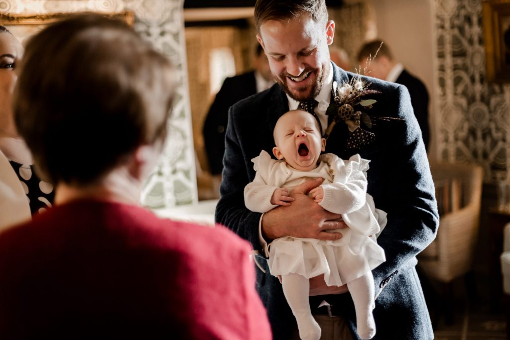 Candid photo of wedding guest at a micro wedding at The Cavendish Hotel