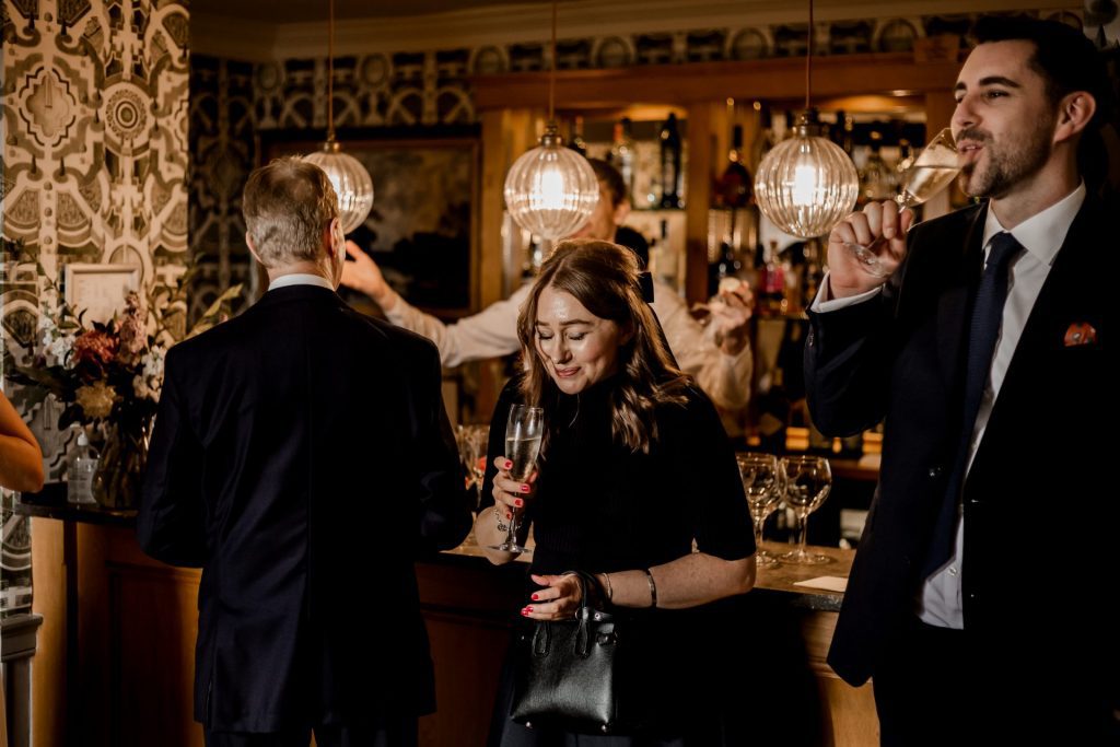 Candid photo of wedding guests at a micro wedding at The Cavendish Hotel