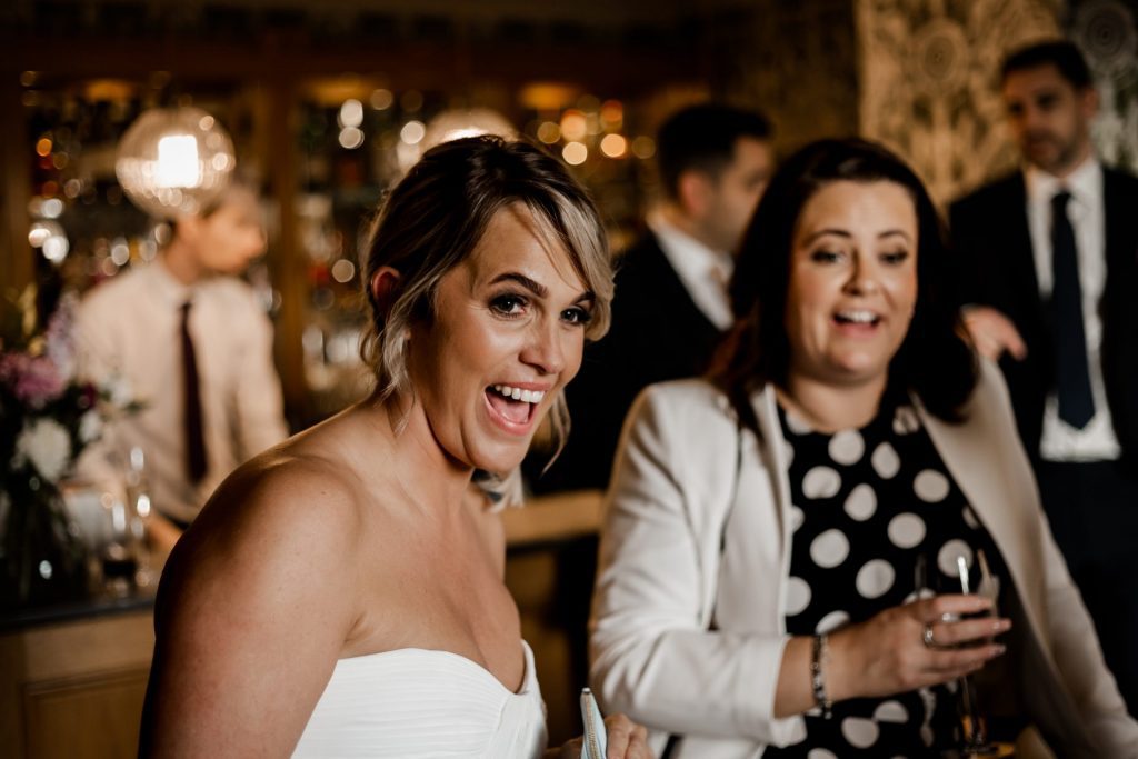 Candid photo of Bride and wedding guests at a micro wedding at The Cavendish Hotel