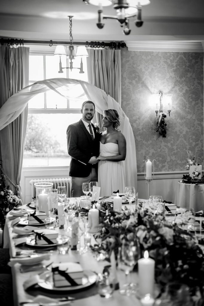 Bride & Groom pose together at their micro wedding wedding breakfast at The Cavendish Hotel