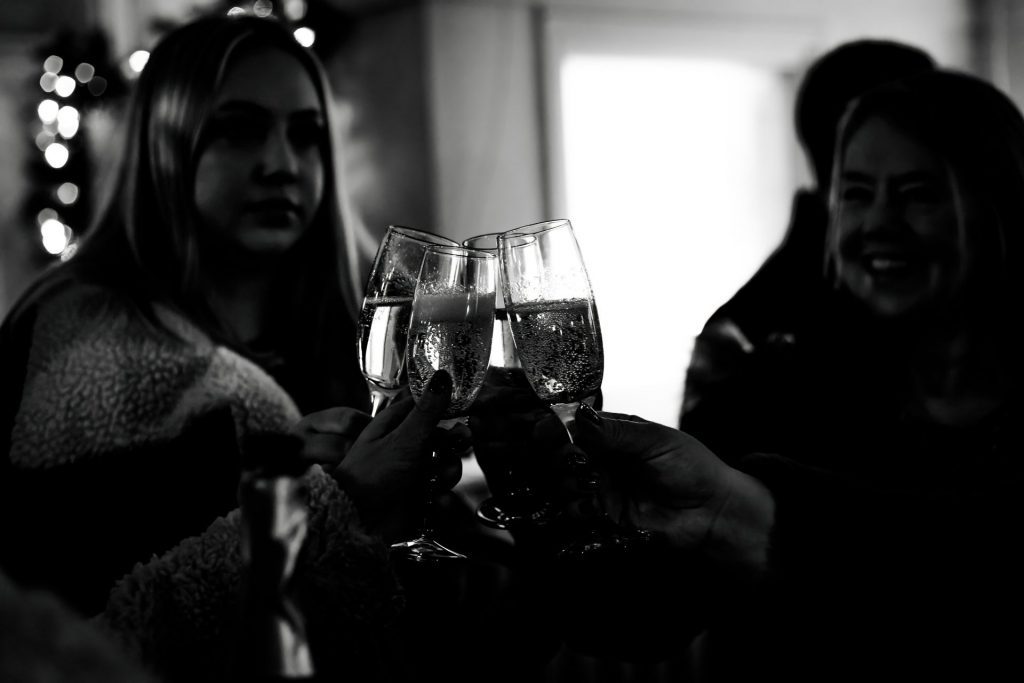 Candid Photo of wedding party before the wedding ceremony. Photo in black & white