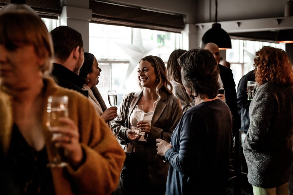 Candid Photo of wedding party before the wedding ceremony. Photo in colour