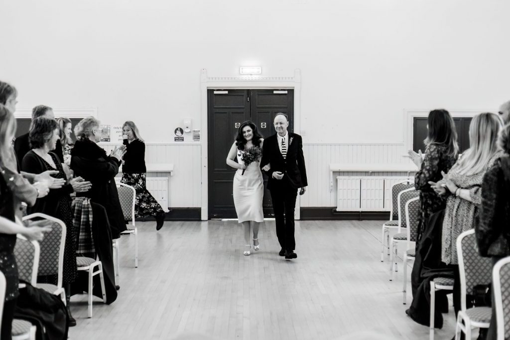Wedding Ceremony of Esme & James at the Bakewell Town. Photo in black & white