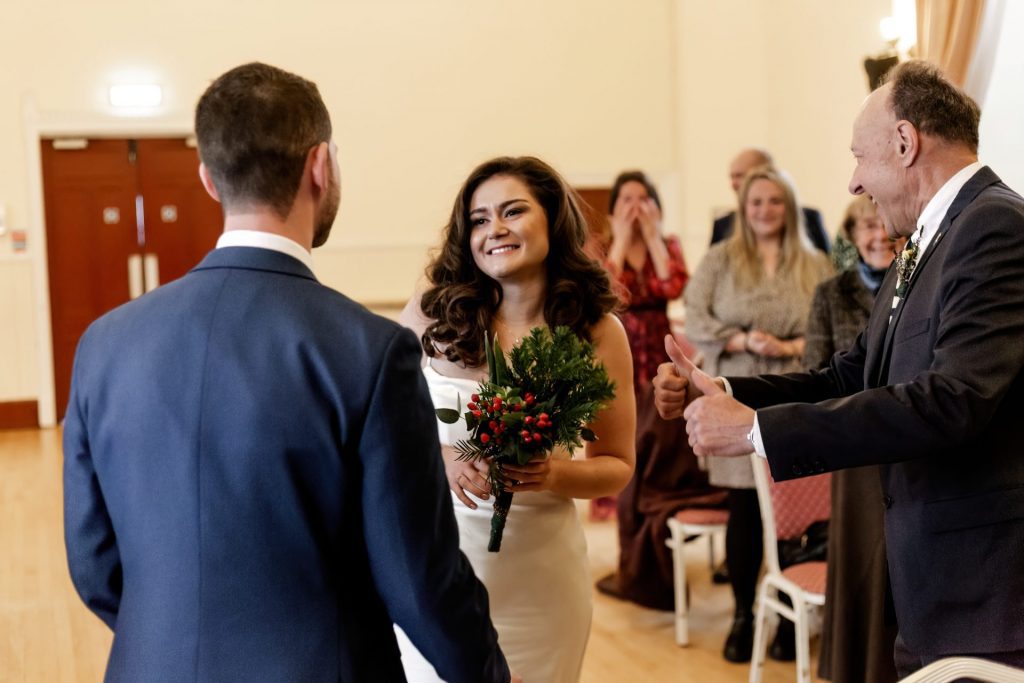 Wedding Ceremony of Esme & James at the Bakewell Town. Photo in colour