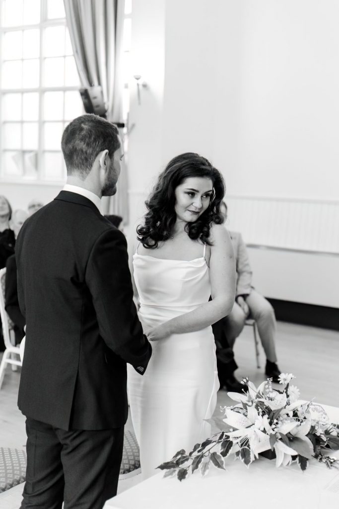 Wedding Ceremony of Esme & James at the Bakewell Town. Photo in black & white