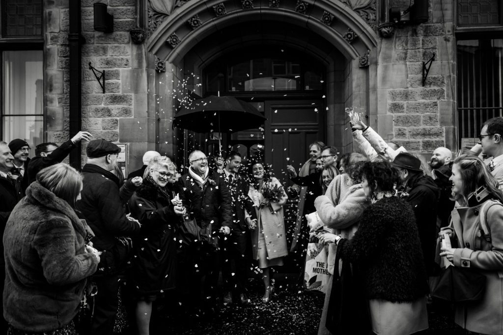 Confetti outside the Bakewell Town Hall. Photo in black & white