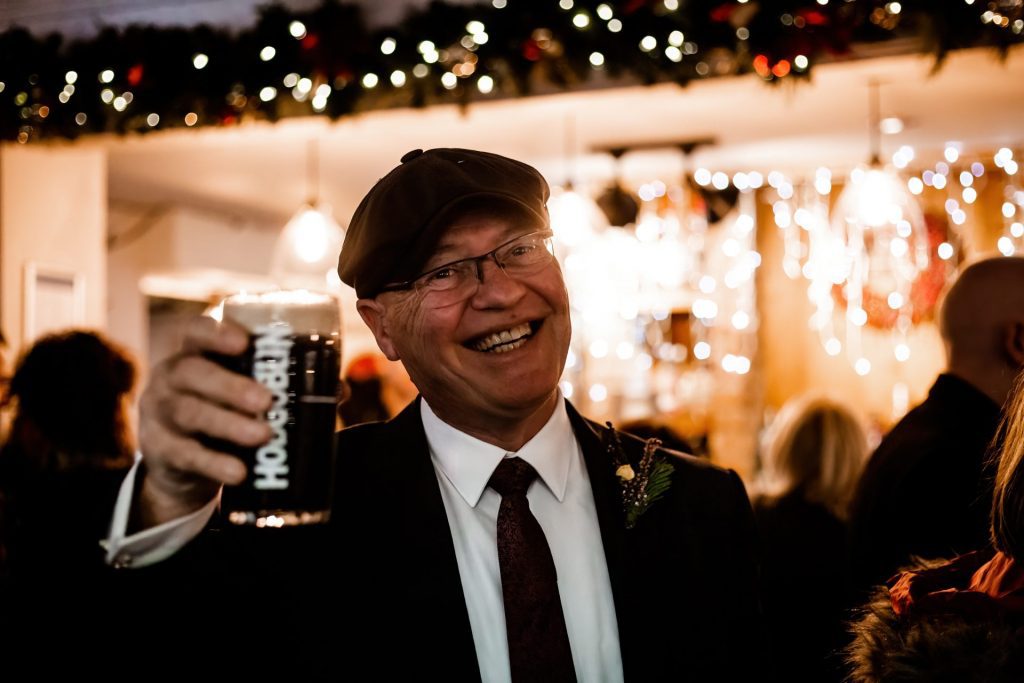 Candid photo of wedding party after the wedding ceremony. Photo in colour