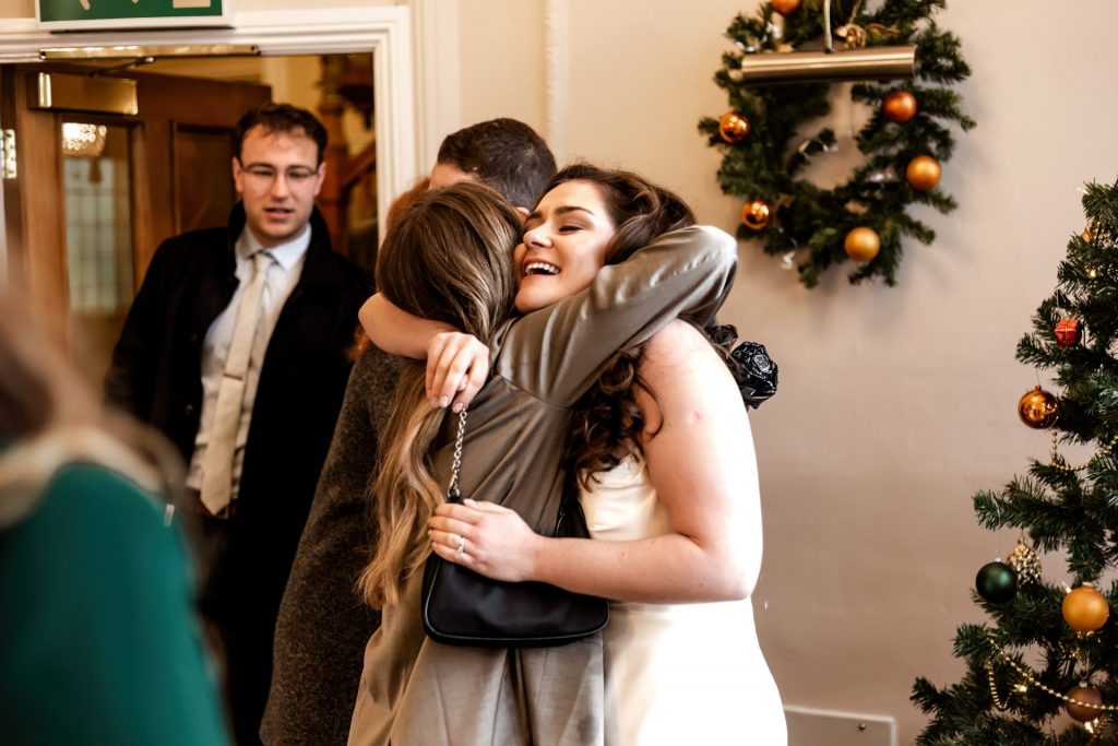 Candid photo during the wedding breakfast at the Monsall Head Pub. Photo in colour.
