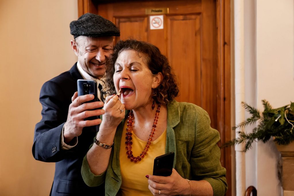 Candid photo during the wedding breakfast at the Monsall Head Pub. Photo in colour.