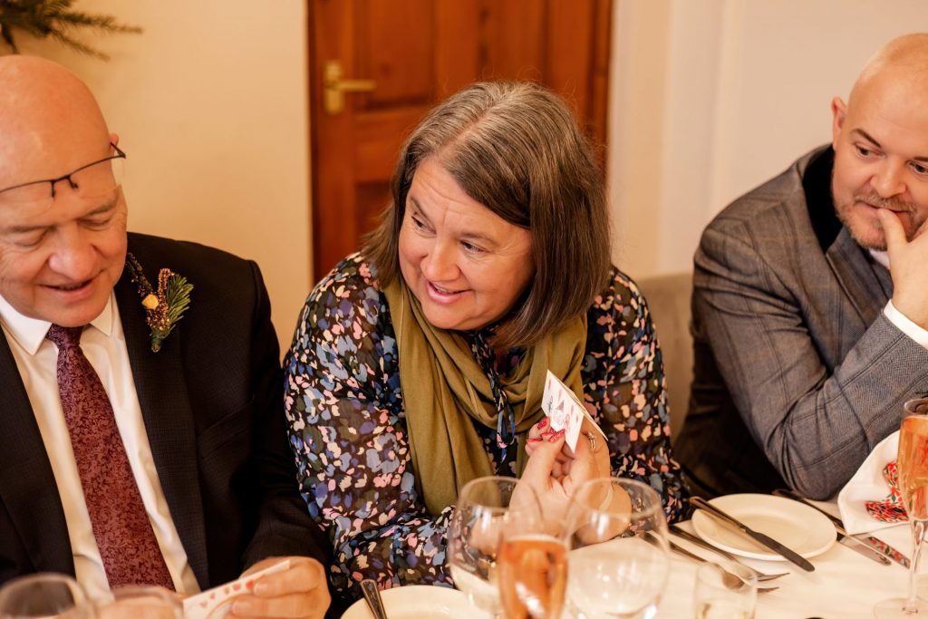 Candid photo during the wedding speeches at the Monsall Head Pub. Photo in colour.