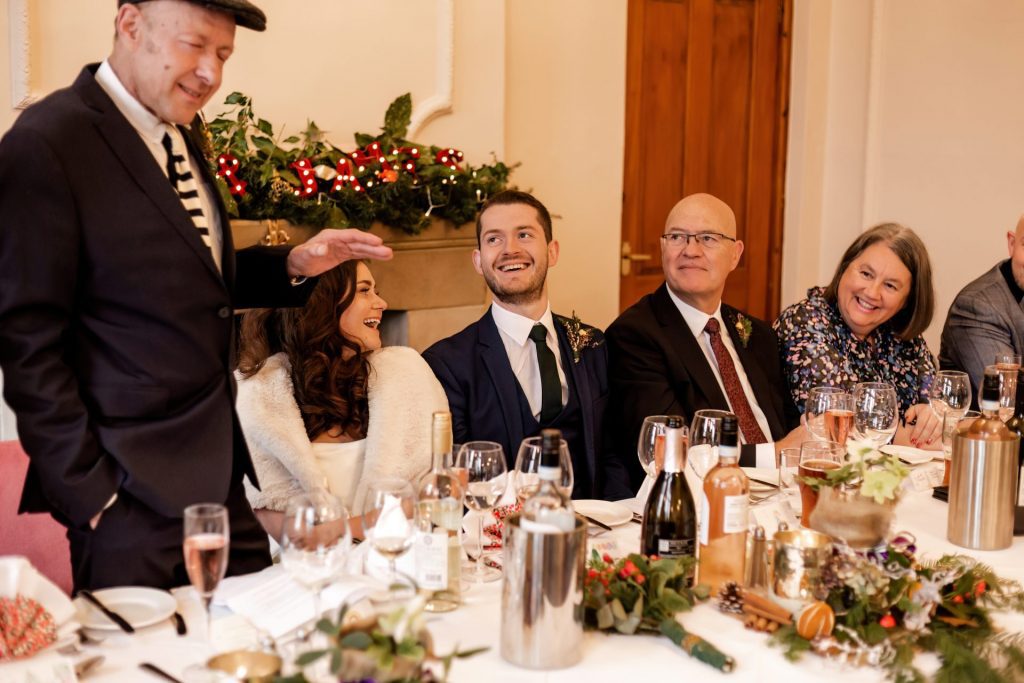 Candid photo during the wedding speeches at the Monsall Head Pub. Photo in colour.