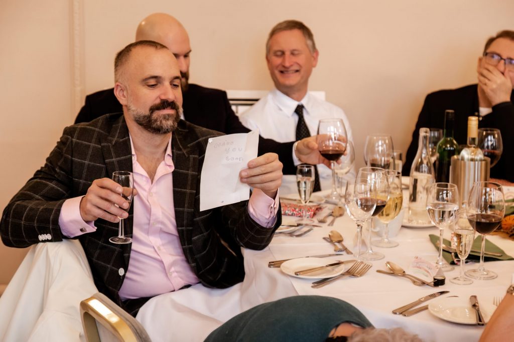 Candid photo during the wedding speeches at the Monsall Head Pub. Photo in colour.
