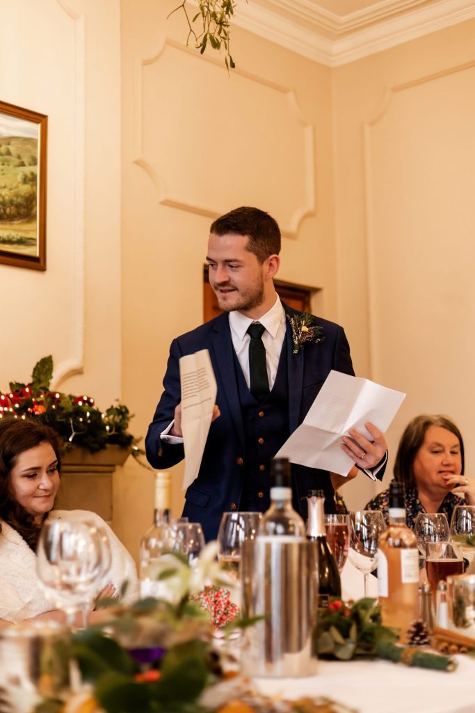 Candid photo during the wedding speeches at the Monsall Head Pub. Photo in colour.