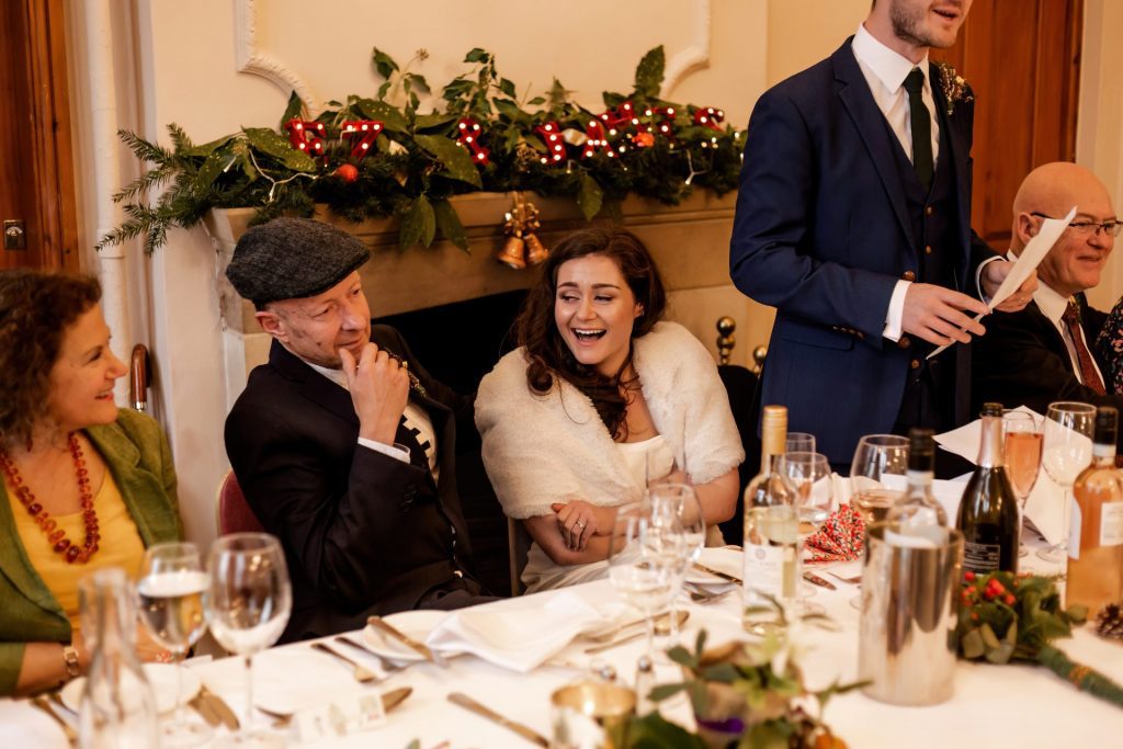 Candid photo during the wedding speeches at the Monsall Head Pub. Photo in colour.