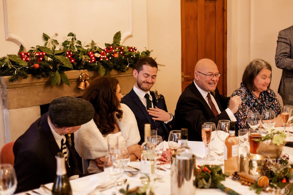 Candid photo during the wedding speeches at the Monsall Head Pub. Photo in colour.