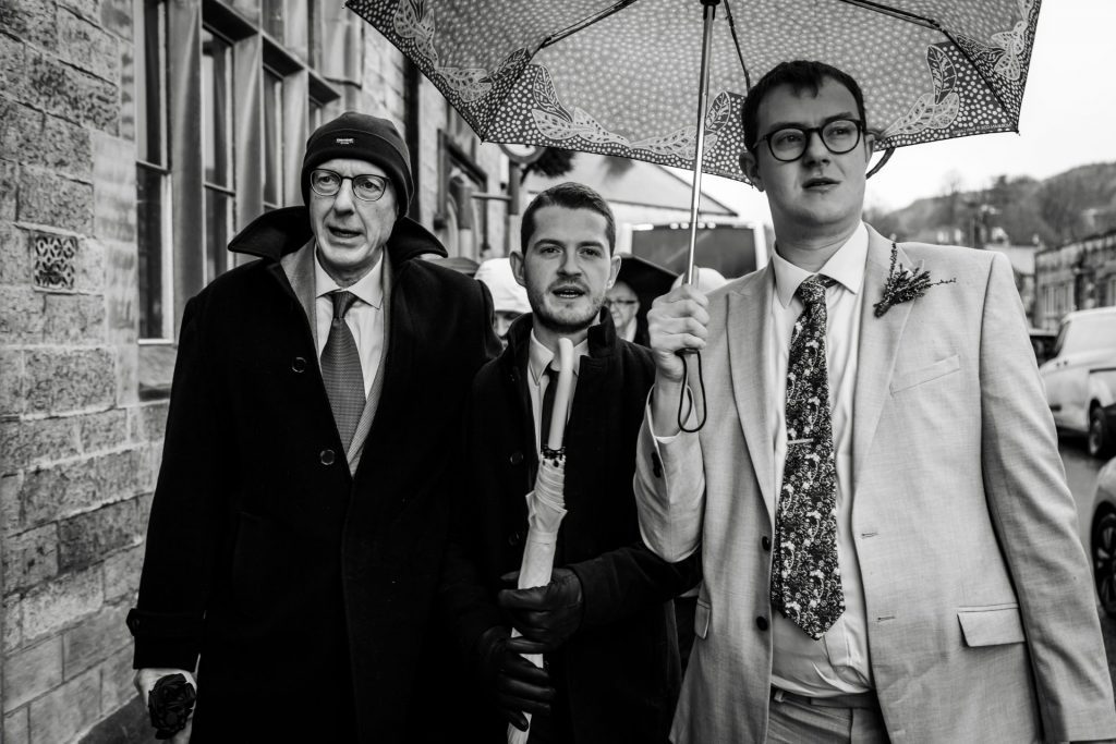 Candid Photo of wedding party before the wedding ceremony. Photo in black & white
