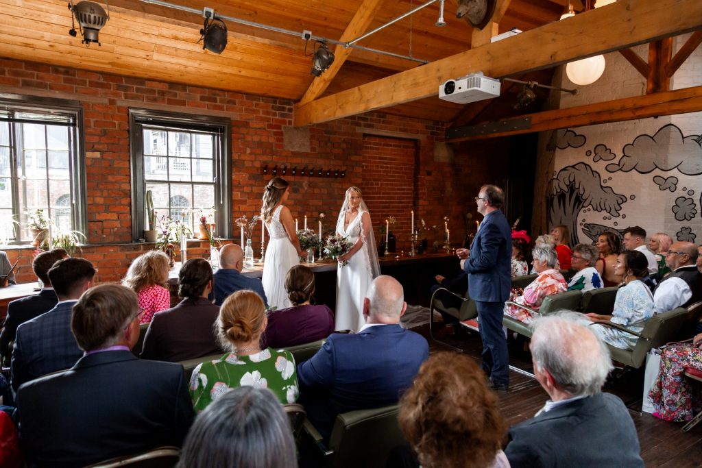 Wide shot of the wedding ceremony at The Chimney House wedding venue, Kelham Island, Sheffield. Isabelle B Photography