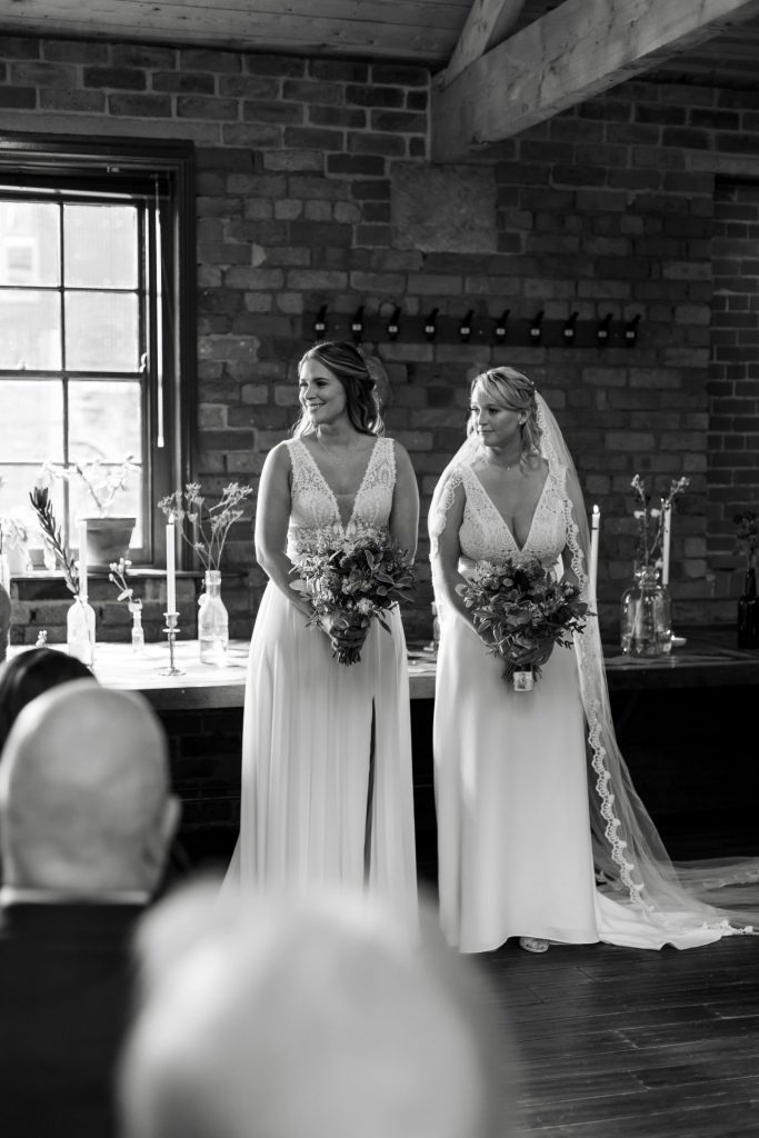 Black & white shot of the wedding ceremony at The Chimney House wedding venue, Kelham Island, Sheffield. Isabelle B Photography