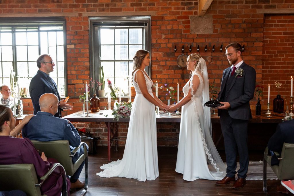 Wide shot of the wedding ceremony at The Chimney House wedding venue, Kelham Island, Sheffield. Isabelle B Photography