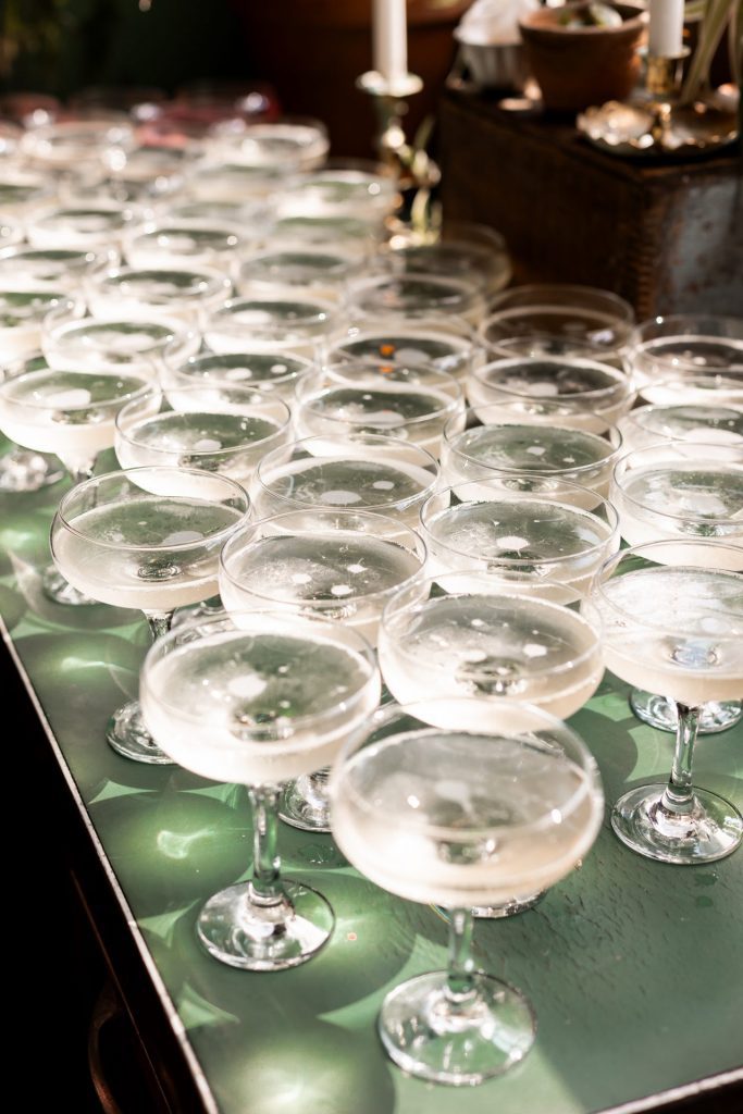 Details shot of the champagne in wide brimmed glasses at The Chimney House wedding venue, Kelham Island, Sheffield. Isabelle B Photography