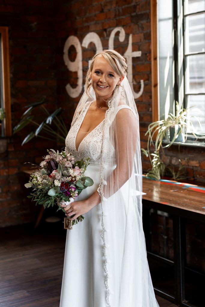 Portrait photo of Bride in The Chimney House wedding venue, Kelham Island, Sheffield. Isabelle B Photography